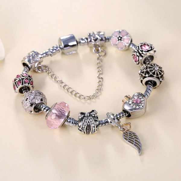 Pink feather charm bracelet